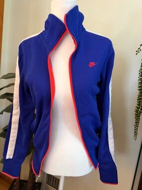 Nike Vibrant Blue Track Jacket with White Sleeve Stripes and Bright Orange Trim